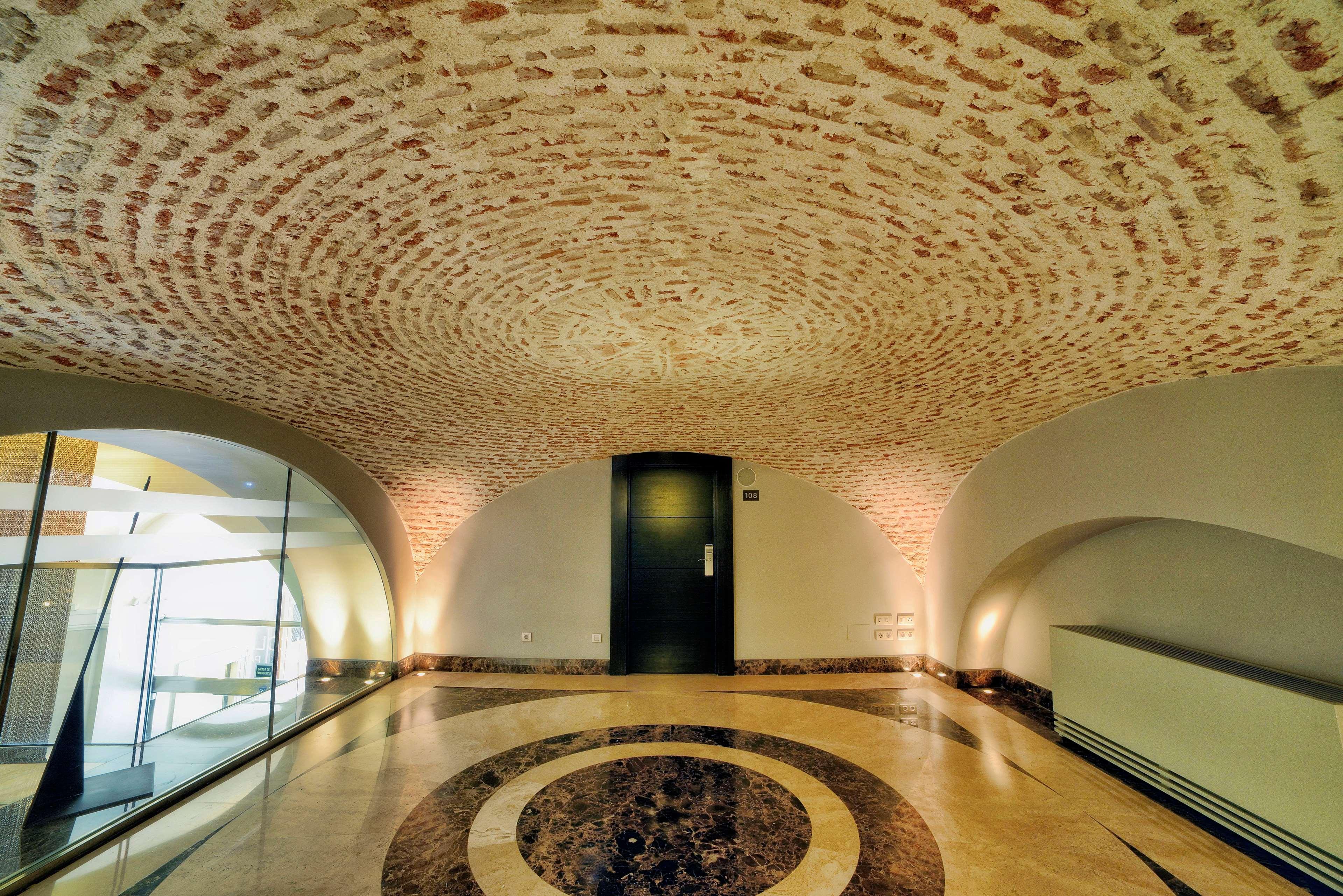 Nh Collection Madrid Palacio De Tepa Exterior photo The vaulting of the entrance to the museum
